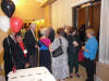 78. Mrs. Corbett, Ed Loring, Ann Morris talking to Marty W., Joanne LaCharite's back, Diane Stratford, and Sally Kemp